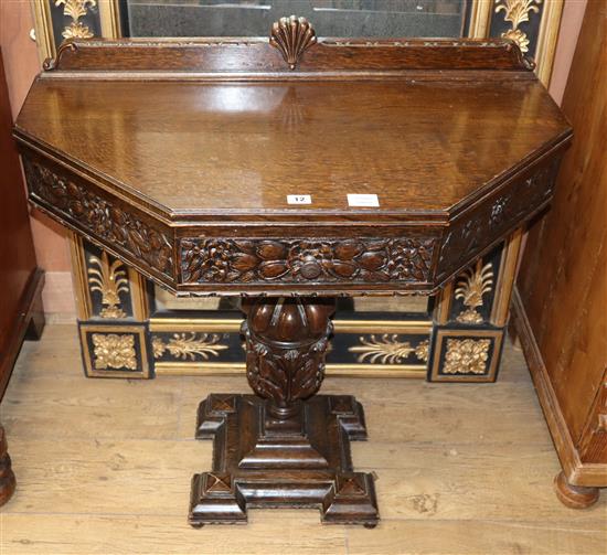 A carved oak hall table, W.89cm D.45cm H.76cm